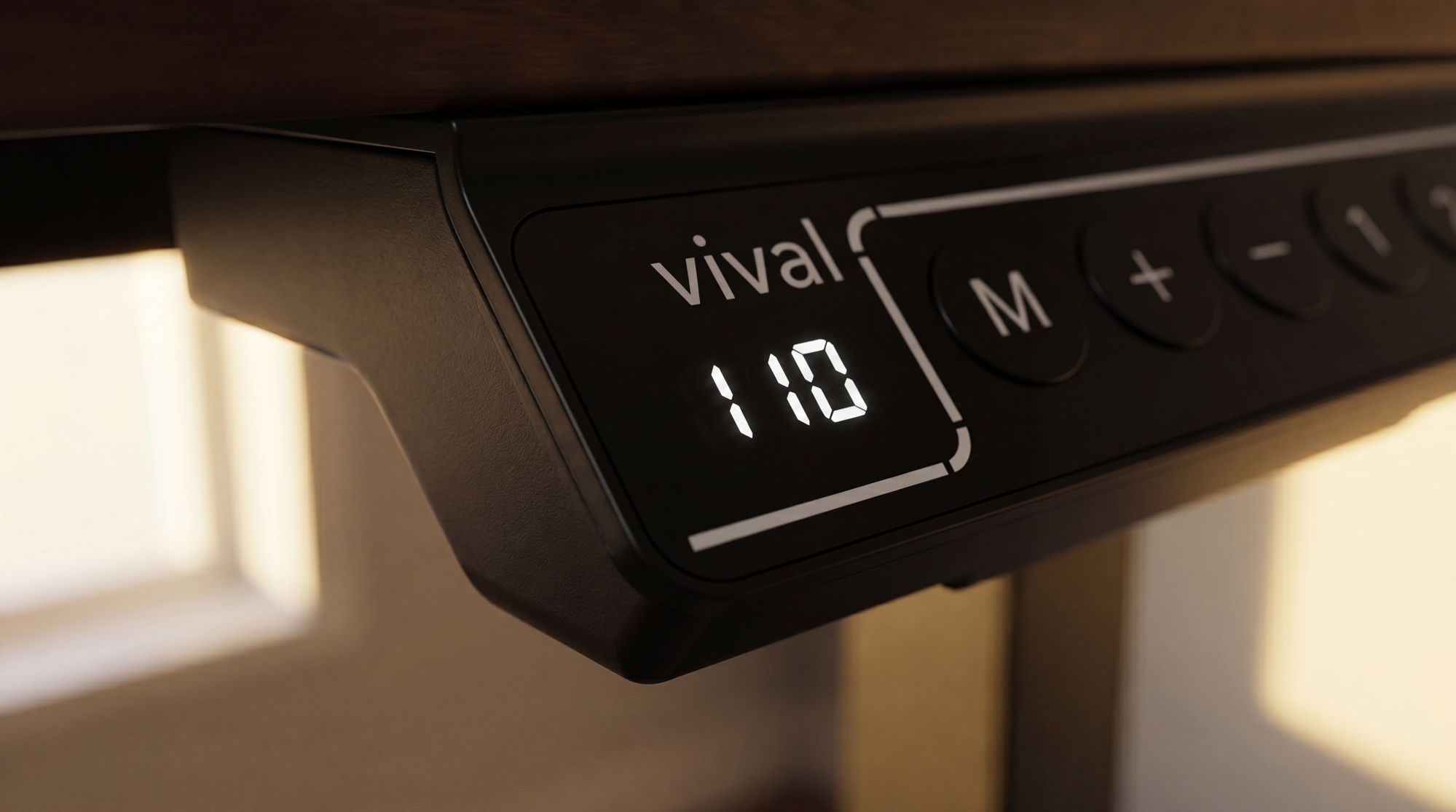 Close-up of the lit Vival controller showing the current height, in a home with warm window light